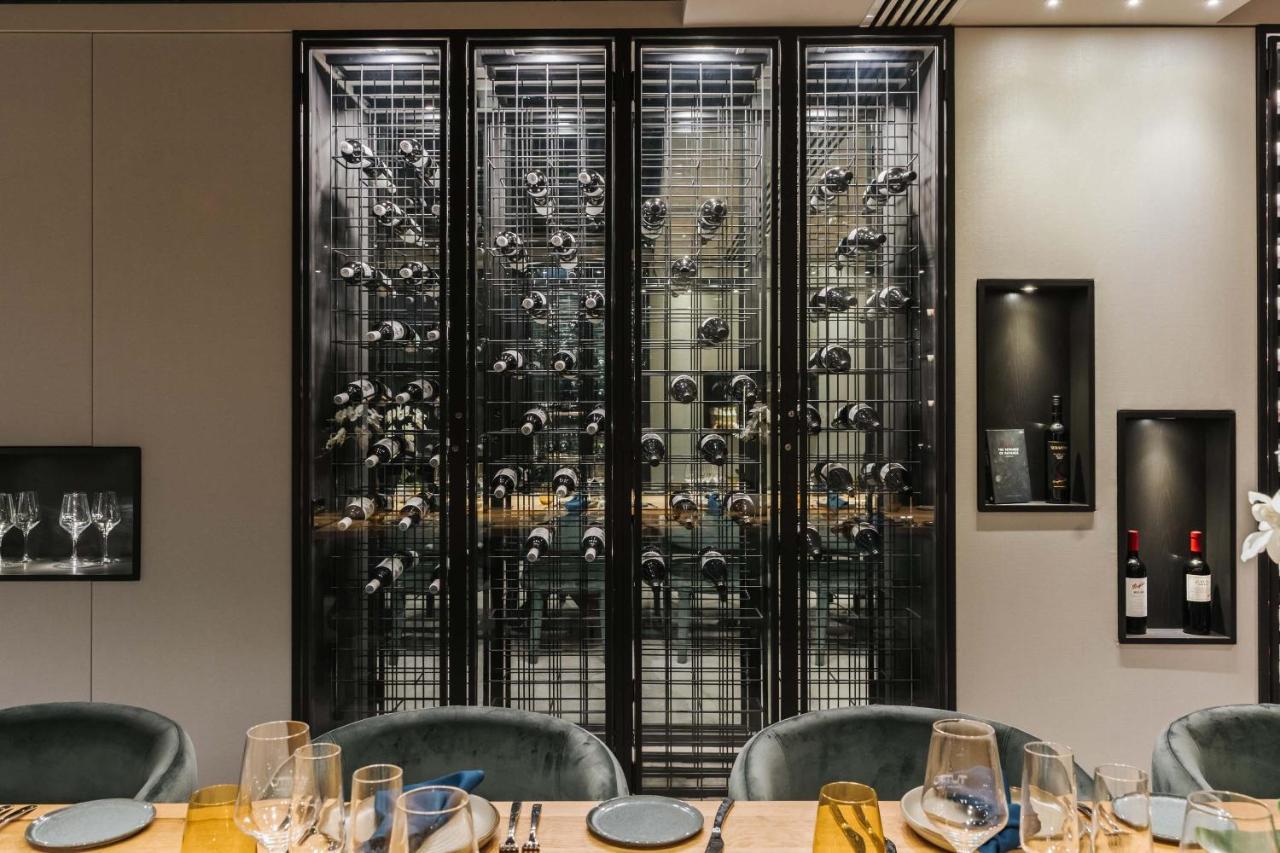 Peppers Waymouth Hotel Adelaide Bagian luar foto Wine display at the restaurant